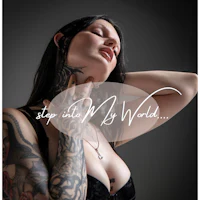 a woman with tattoos on her chest